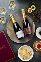 Michel Foch Champagne Duo holiday gift set featuring two bottles of Michel Foch Brut with a branded gift box.