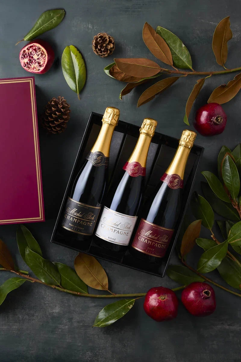 Image of the Michel Foch Champagne Trio holiday gift set featuring 3 bottles of Michel Foch Champagne in an elegant branded gift box.